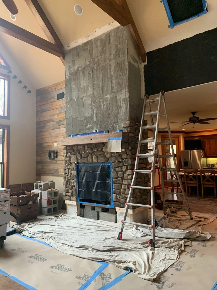 Fireplace remodel in progress in a Celina living room